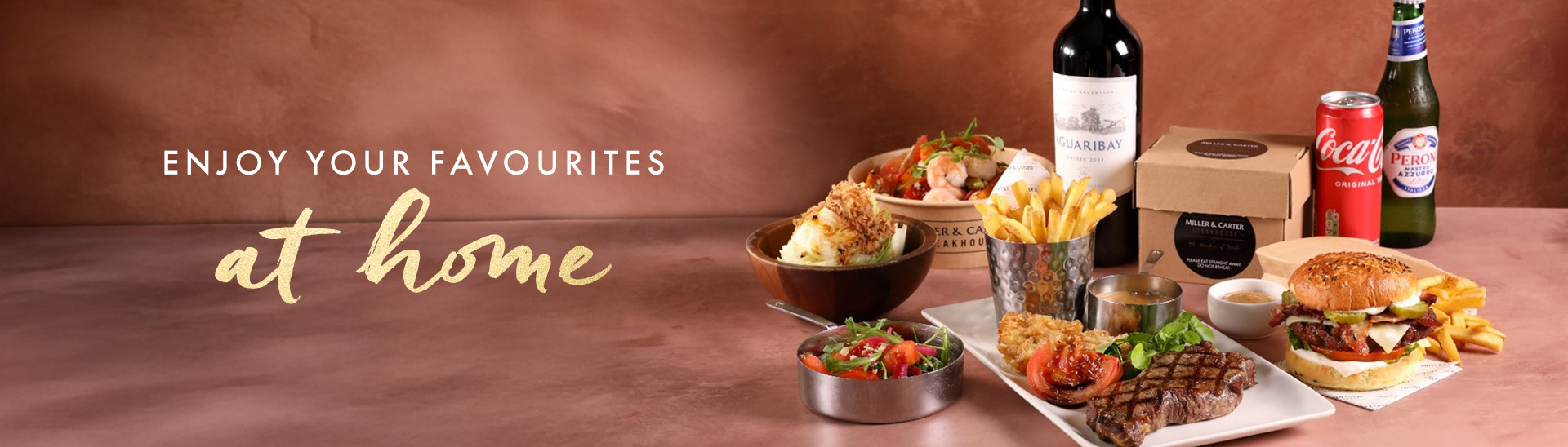 Miller & Carter takeaway steak with sides and drinks for enjoying a restaurant meal at home